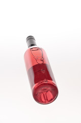 bottle of red wine isolated on white background