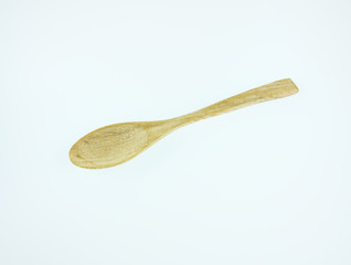 Wooden spoon on white background,