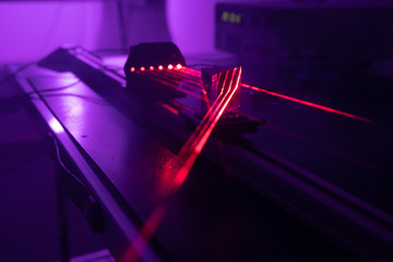 Experiment with red laser in optics lab