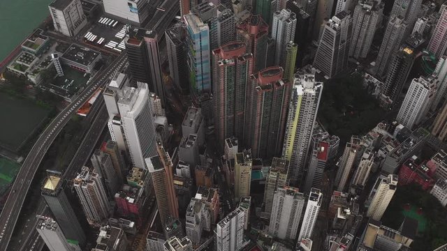 Fly above Urban city scene around victoria harbour central area in day, Hong Kong , 4k high resolution video