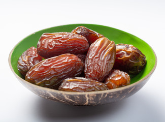Pile of sweet tasty dried dates fruits close up isolated