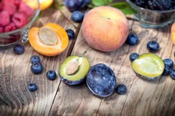 Healthy organic food - fresh, raw fruits on table