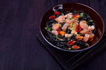 Black spaghetti with cuttlefish ink and seafood