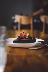 Vegan raw chocolate flourless piece of cake