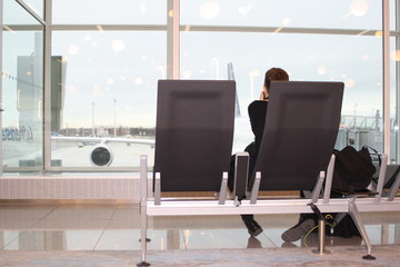 businessman waiting in a airport,  professional business meeting on-line 