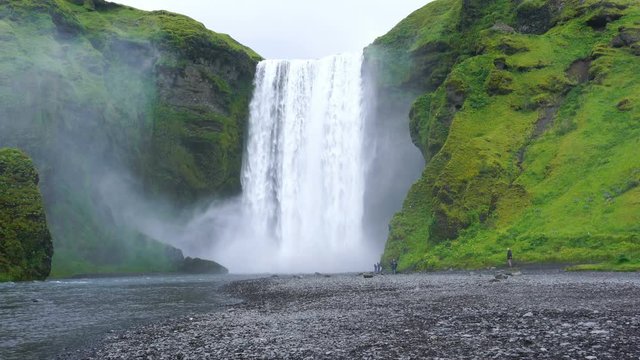 View of the well known beautiful Skogafoss waterfall in rainy day at South Iceland