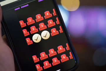 Using mobile smart phone buy cinema tickets © Dontree