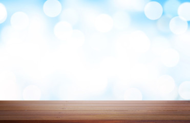 Wooden product display with blue gradient background