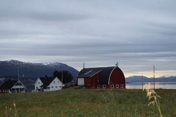 norway, tromso. fiord and a farm