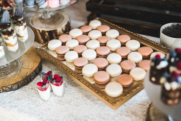 French sweet colorful macarons background, close up