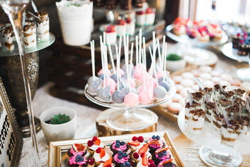 Delicious wedding reception candy bar dessert table