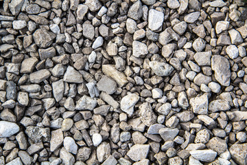 Тexture of white limestone crushed stone of various sizes.