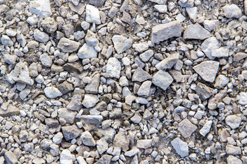 Тexture of white limestone crushed stone of various sizes.