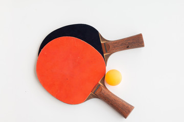 Table tennis racket with orange ball