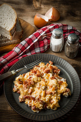 Scrambled eggs with sausage.