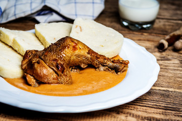 Chicken thigh on red pepper sauce
