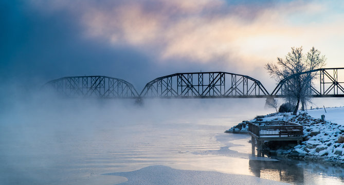 Bridge disappearing into fog