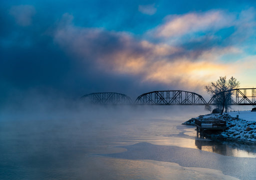 Bridge disappearing in fog