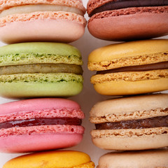 Set of different multi-colored macaroon cookies. colorful almond cookies, french sweet delicacy. Sweet macarons in gift box. Food background. Close-up. Top view.