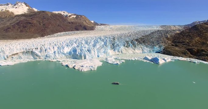Aerial View of Boat passing by O'Higgins Glacier, Bernardo O'Higgins National Park, Patagonia, Chile