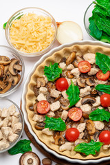 shortbread dough for baking quiche tart and filling in baking form