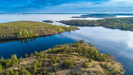 Naklejka na ściany i meble Islands from a height. Lake with islands. Karelia. Russia. Wildlife of Russia. Ladoga lake. Republic of Karelia.