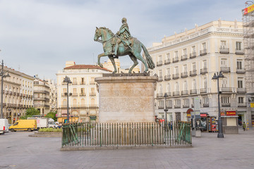 Madrid, Spain. View of the monument to Charles III in Puerta del Sol