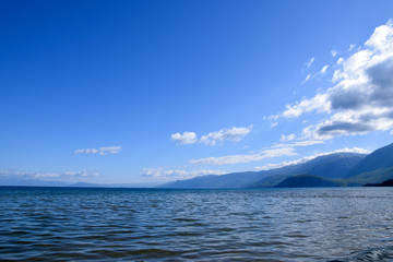 Obraz premium Landscape of Ohrid lake with mountain background. Pogradec, Tushemisht, Albania.