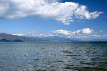 Landscape of Ohrid lake with mountain background. Pogradec, Tushemisht, Albania.