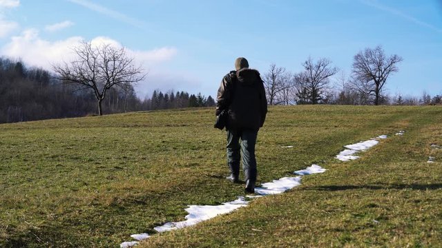 Man goes to a lone tree - (4K)