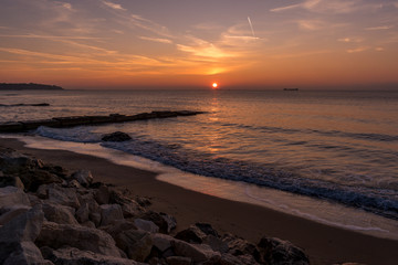 Early autumn sea sunrise at the beach.