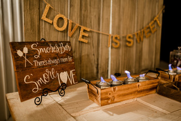 Smores Bar at event with Love is Sweet quote.