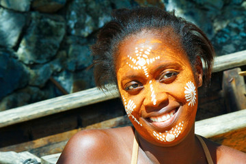 Woman with traditionally painted face, Madagascar