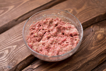 Fresh minced meat with bread for making meatballs.