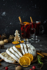 Traditional stollen and milled Hot wine cake and Christmas decorations