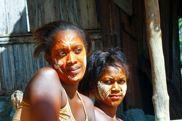 Woman with traditionally painted face, Madagascar