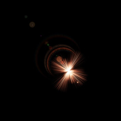 Isolated realistic lens flare visual effect on black night background. Space star. 