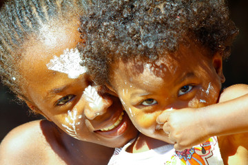 Girl with traditionally painted face, Madagascar