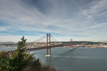 Fototapeta na wymiar The famous 25th April Bridge in Lisbon, Portugal