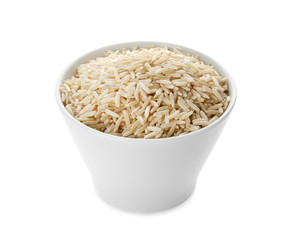 Ceramic bowl with brown rice on white background