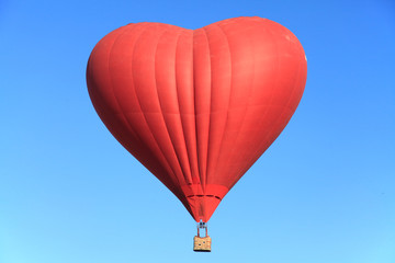 Obraz premium The red heart in the blue sky. St. Valentine's day