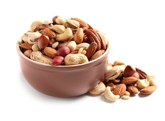 Bowl with mixed organic nuts on white background