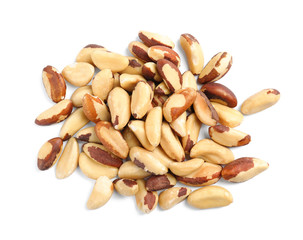 Tasty brasil nuts on white background, top view