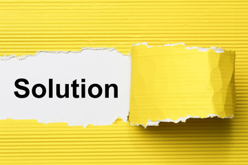 Solution, Inspiration and business concept on torn paper