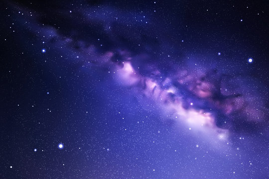 Fototapeta Space background with night starry sky and Milky Way. Dark blue nebula
