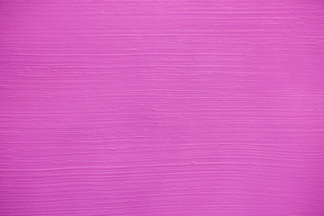 Striped pattern on a pink wall