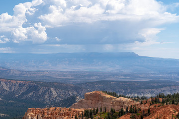 Rainbow Point at Bryce Canyon National Park on a sunny day, as a storm approaches the area