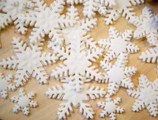 Fototapeta na wymiar Cookies with icing. Christmas cookies in the shape of snowflakes.