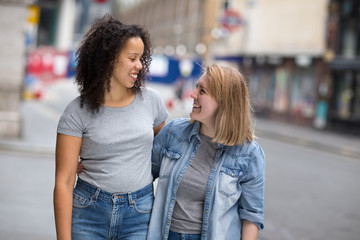 Fototapeta premium happy lesbian couple in the street