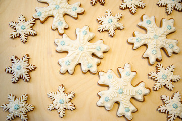 Cookies with icing. Christmas cookies in the shape of snowflakes.